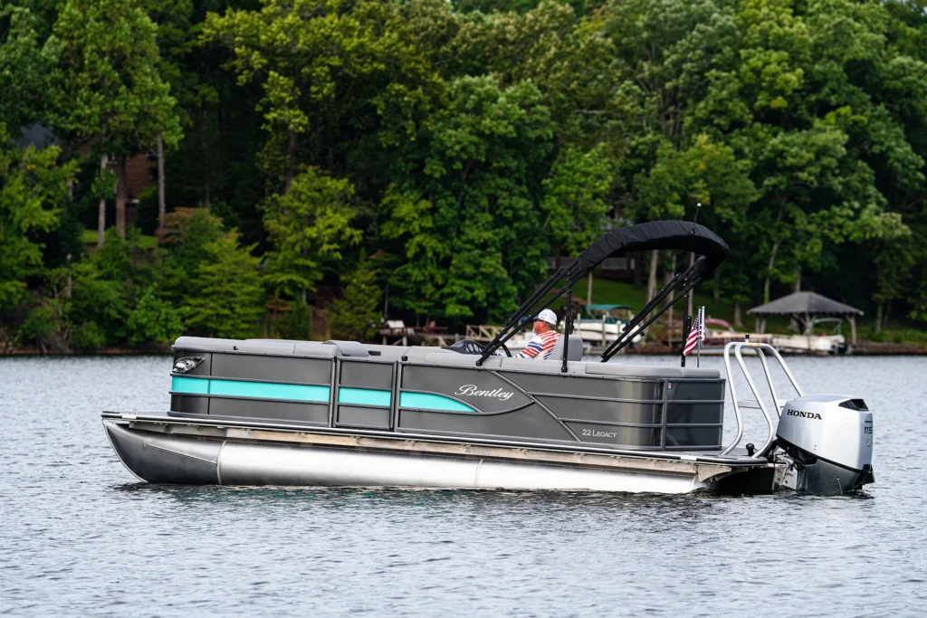 Bentley 222 pontoon boat on the water