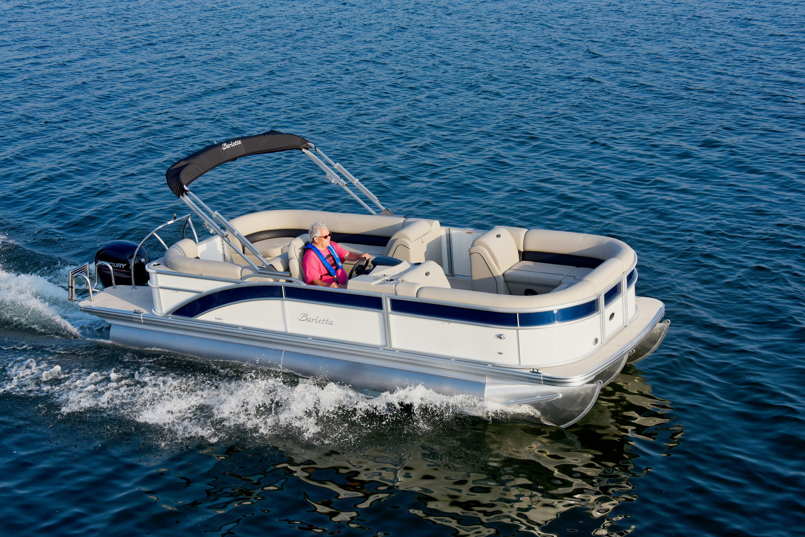 Barletta E22Q pontoon boat on the water